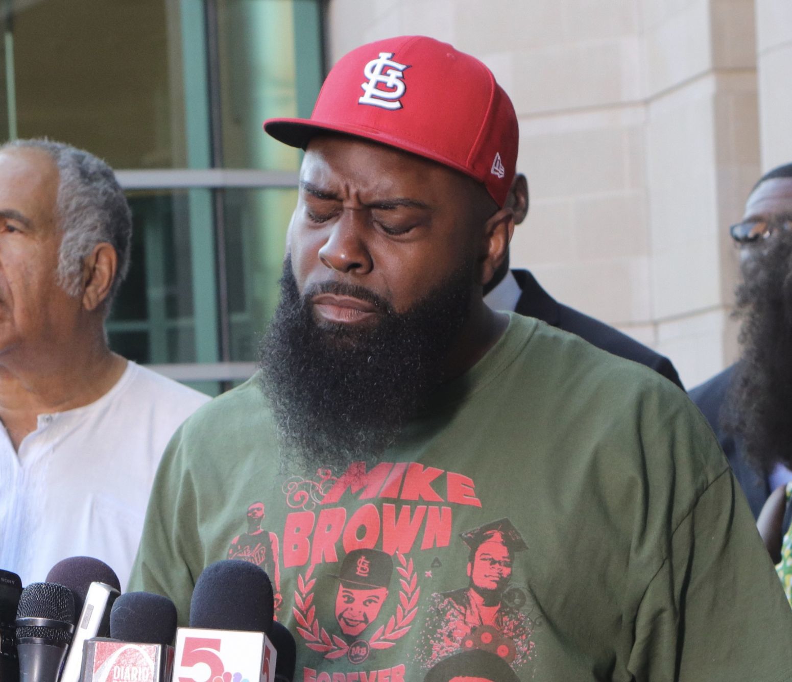 Michael Brown Sr. speaks to the press